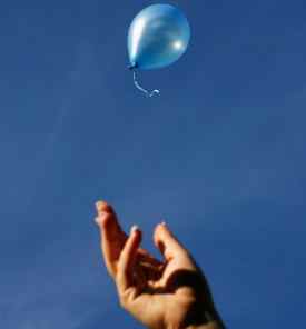 tfwco.com cool concepts - this image shows a hand releasing a helium balloon into the sky